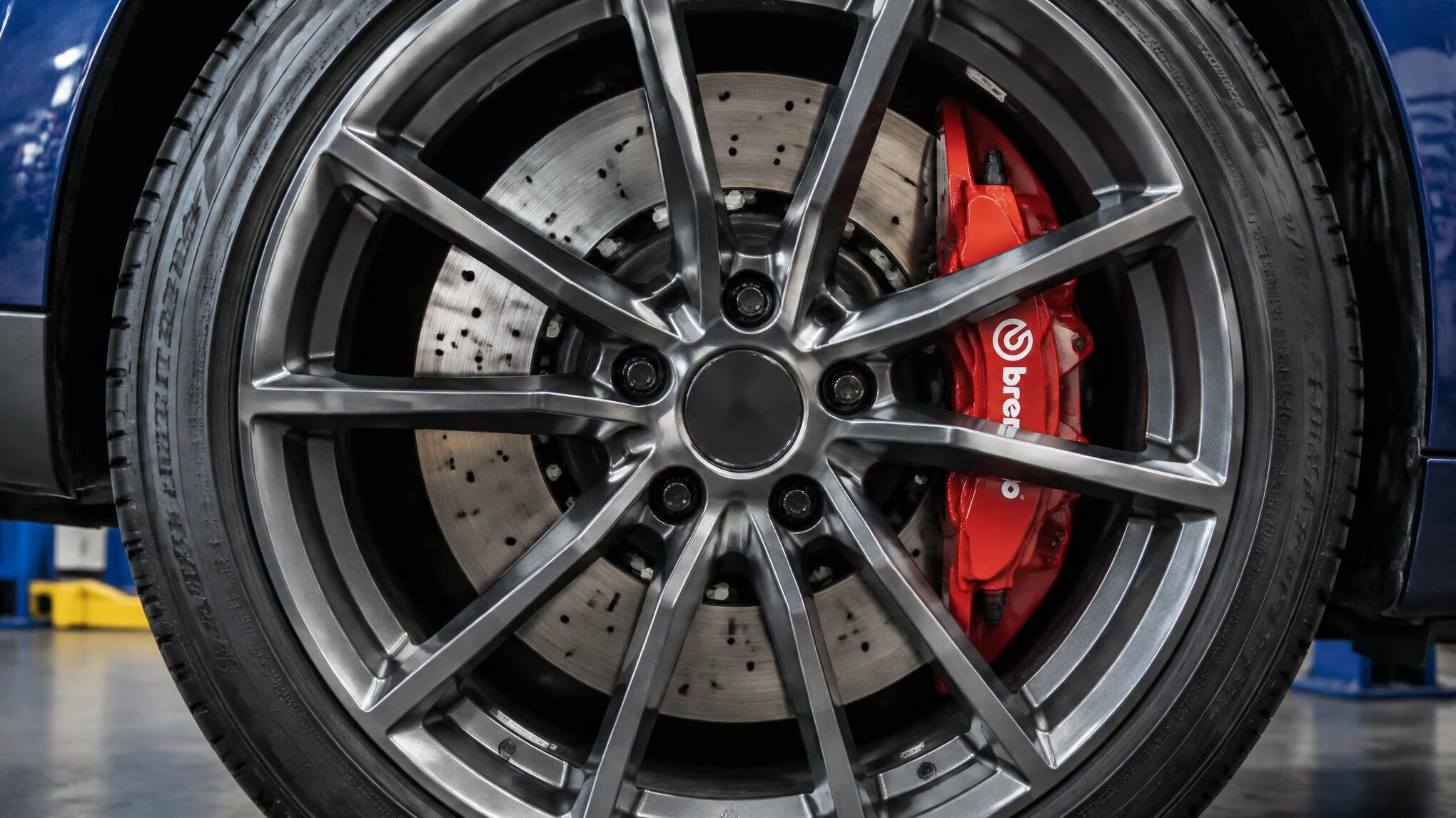 Car brake disc and caliper close-up